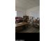 Cozy living room with natural light, wood floors, and comfortable seating at 2511 N 56Th St, Mesa, AZ 85215