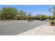 The gated entrance to Desert Diamond Estates features lush desert landscaping at 28045 N 112Th Pl, Scottsdale, AZ 85262