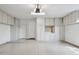 This spacious garage is equipped with built-in cabinets and ample storage space at 28045 N 112Th Pl, Scottsdale, AZ 85262