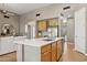 Spacious kitchen with island, ample cabinetry, and seamless flow into the adjacent living and dining areas at 28045 N 112Th Pl, Scottsdale, AZ 85262