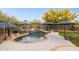 Beautiful pool with mature landscaping and water features for relaxation and entertainment at 28045 N 112Th Pl, Scottsdale, AZ 85262
