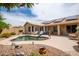 Backyard showcasing a pool, solar panels, and a covered patio, ideal for outdoor living at 3022 N 148Th Ave, Goodyear, AZ 85395