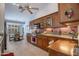 Kitchen with stainless steel appliances, ample cabinet space, and modern tile backsplash at 3022 N 148Th Ave, Goodyear, AZ 85395