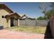 Fenced in backyard with covered patio at 3559 N 143Rd Ave, Goodyear, AZ 85395
