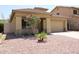 Single story home with desert landscaping and two car garage at 3559 N 143Rd Ave, Goodyear, AZ 85395