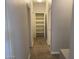 Hallway with a linen closet at 3559 N 143Rd Ave, Goodyear, AZ 85395