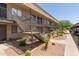 Exterior view of building with desert landscaping, stairs, walkways, and covered parking at 5995 N 78Th St # 2078, Scottsdale, AZ 85250