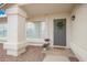 Welcoming front porch featuring decorative accents and a charming 'welcome' door mat at 8516 W Saint John Rd, Peoria, AZ 85382