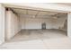 Spacious two-car garage with ample storage cabinets, lighting, and room for parking at 8516 W Saint John Rd, Peoria, AZ 85382