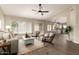 Spacious living room with an open concept floor plan and lots of natural light at 8516 W Saint John Rd, Peoria, AZ 85382