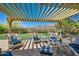 Inviting outdoor patio with comfortable seating and a picturesque mountain backdrop at 12240 S Honah Lee Ct, Phoenix, AZ 85044
