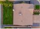 Aerial view of roof and landscaped yard showing manicured lawn and gravel beds with plants at 2178 E La Jolla Dr, Tempe, AZ 85282