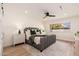Beautiful bedroom featuring a large window and stylish gray bed frame with green accents at 2178 E La Jolla Dr, Tempe, AZ 85282