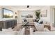 Bright living room features stylish furnishings, a large window, and an inviting atmosphere at 2178 E La Jolla Dr, Tempe, AZ 85282