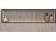 Close up on tiled shower niche with soaps and decorative accents at 2178 E La Jolla Dr, Tempe, AZ 85282