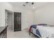 Bedroom with carpeted floors and doors leading into other rooms at 21840 N 260Th Ln, Buckeye, AZ 85396