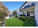 Backyard showing manicured lawn, beautiful pool, patio seating and barbecue at 2308 E State Ave, Phoenix, AZ 85020
