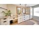 Bathroom features double sinks, granite countertops, pendant lighting and decorative fixtures at 2308 E State Ave, Phoenix, AZ 85020