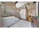 Foyer view features an open staircase, high ceilings, and hardwood floors throughout the home at 2308 E State Ave, Phoenix, AZ 85020