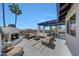 Stylish outdoor patio featuring a fireplace, comfortable seating, and scenic views at 2308 E State Ave, Phoenix, AZ 85020