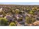 This elevated view showcases the home's neighborhood with mature trees and well-maintained lawns at 4554 S Cobblestone St, Gilbert, AZ 85297