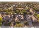 This aerial photo displays a neighborhood known for mature trees, landscaping, and sunny skies at 4554 S Cobblestone St, Gilbert, AZ 85297