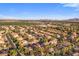 The community aerial view displays homes in a residential neighborhood with open land views at 4554 S Cobblestone St, Gilbert, AZ 85297