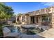 Inviting pool area with a patio and a view of the surrounding landscape at 4554 S Cobblestone St, Gilbert, AZ 85297