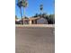 Charming single-story home with desert landscaping and a two-car garage at 5219 W Eugie Ave, Glendale, AZ 85304