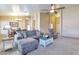 Inviting living room featuring comfortable seating, soft lighting, and neutral decor at 6102 W Shangri La Rd, Glendale, AZ 85304