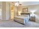 Spacious main bedroom featuring neutral colors and ensuite bath at 6102 W Shangri La Rd, Glendale, AZ 85304