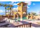 Luxury community pool area with water slides, lounge chairs and resort-style amenities at 6557 S Classic Way, Gilbert, AZ 85298