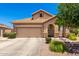 Charming single-Gathering home featuring a tile roof and a welcoming two-car garage in a well-maintained neighborhood at 6557 S Classic Way, Gilbert, AZ 85298