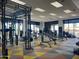 Well-equipped community fitness center with a variety of exercise machines and weights at 6557 S Classic Way, Gilbert, AZ 85298