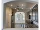 Modern kitchen featuring sleek countertops, stainless steel appliances, and an open layout at 6557 S Classic Way, Gilbert, AZ 85298