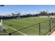Outdoor sports court with manicured artificial turf and fence enclosure at 6557 S Classic Way, Gilbert, AZ 85298
