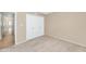 Bedroom with carpet, a ceiling fan, and a closet with white bi-fold doors at 8666 E Cheryl Dr, Scottsdale, AZ 85258