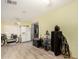 Simple living room featuring laminate floors, with ample storage at 11422 W Hidalgo Ave, Tolleson, AZ 85353