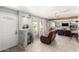 Inviting living room with wood-look floors and light gray walls at 11422 W Hidalgo Ave, Tolleson, AZ 85353