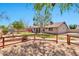 Spacious backyard boasts a fire pit, mature trees, and plenty of room for outdoor activities at 1210 W Stottler Dr, Chandler, AZ 85224