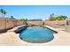 Inviting backyard pool featuring blue tile accents, stone coping, and ample space for relaxation and leisure at 1210 W Stottler Dr, Chandler, AZ 85224