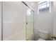 Bright, clean bathroom featuring a tub and shower combination with a white sliding glass door at 1225 N 36Th St # 2119, Phoenix, AZ 85008