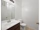Well-lit bathroom showcasing a vanity with sleek fixtures, a toilet, and a shower with glass doors at 1225 N 36Th St # 2119, Phoenix, AZ 85008