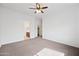 Spacious bedroom featuring soft carpet, neutral paint, and ceiling fan at 1225 N 36Th St # 2119, Phoenix, AZ 85008