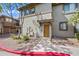 Inviting two-story townhome with a well-maintained front yard and a pathway to the front door at 1225 N 36Th St # 2119, Phoenix, AZ 85008