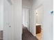Hallway with access to bathroom and bedrooms, carpet floor and white trim at 1225 N 36Th St # 2119, Phoenix, AZ 85008