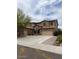 Charming two-story home with a three-car garage and a well-manicured front yard in a nice neighborhood at 12518 W Milton Dr, Peoria, AZ 85383