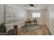 Charming bedroom with a ceiling fan, light wood flooring, and a cozy area rug at 1263 W Devonshire St, Mesa, AZ 85201