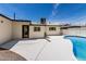 Backyard featuring pool, home exterior, and patio space to enjoy a relaxing summer by the pool at 1313 N 71St St, Scottsdale, AZ 85257