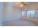 This bedroom has a vaulted ceiling and two large windows at 1463 W Mead Dr, Chandler, AZ 85248